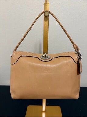 Coach Tan Leather Turnlock Wristlet